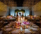 interior view of table setting and overhead lighting at wedding venue