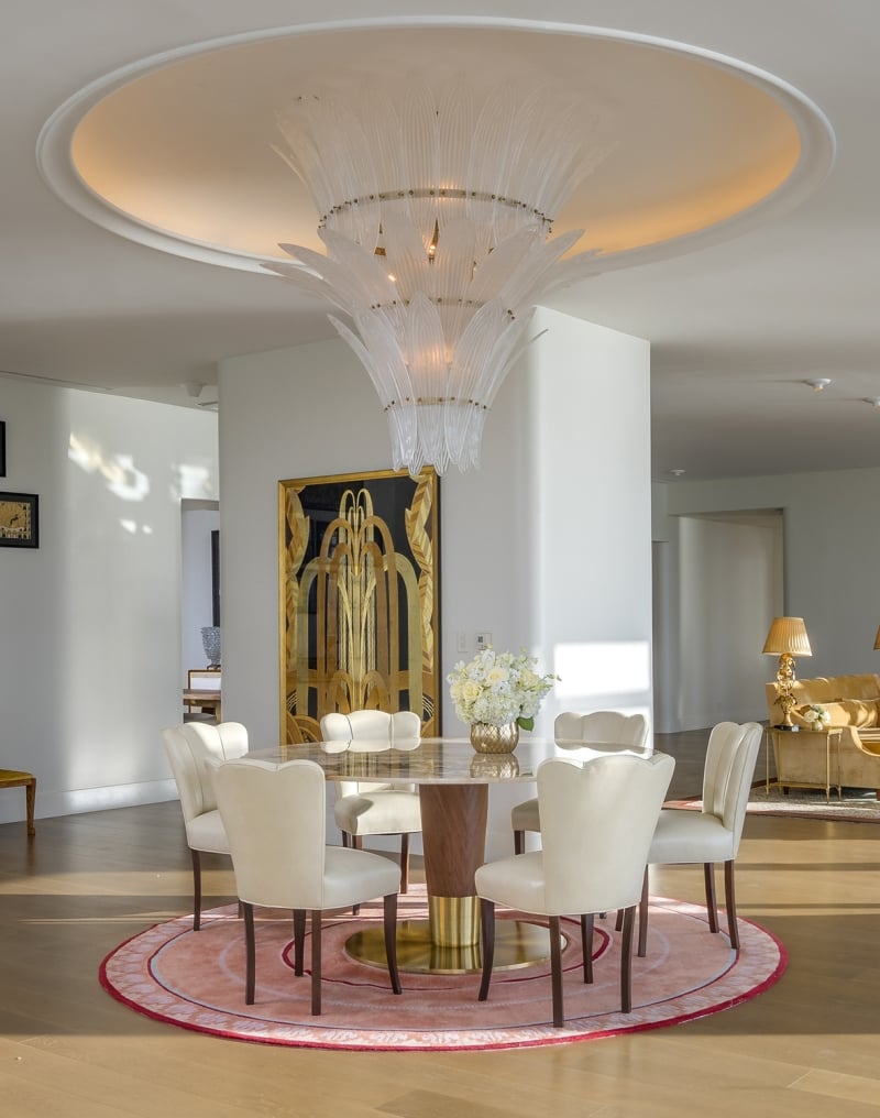 hotel penthouse open space with dining and living areas