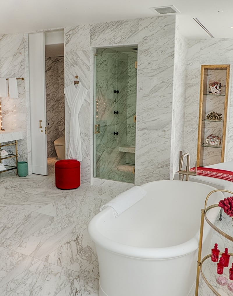 hotel bathroom with large stand alone bathtub