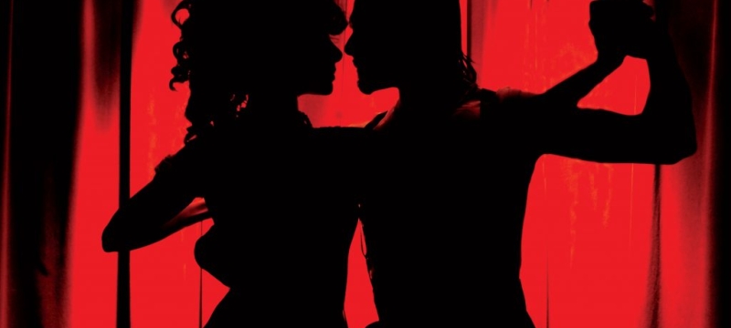 man and woman in silhouette dance the tango