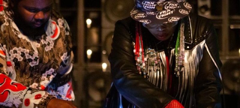 Suzi Analogue and DJ Earl perform at DJ booth