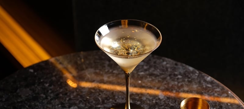 cocktail sits on granite table top