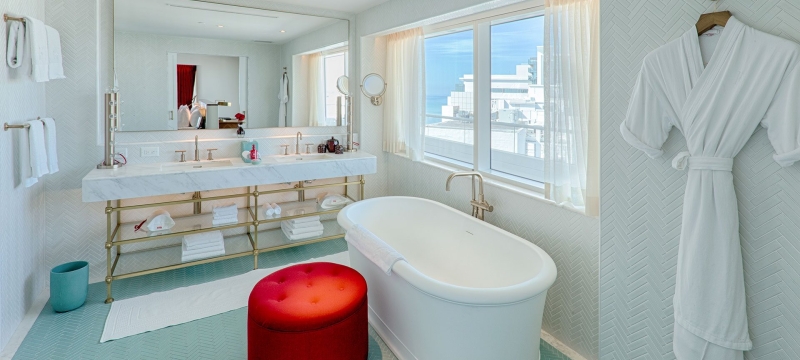hotel bathroom with large stand alone bathtub