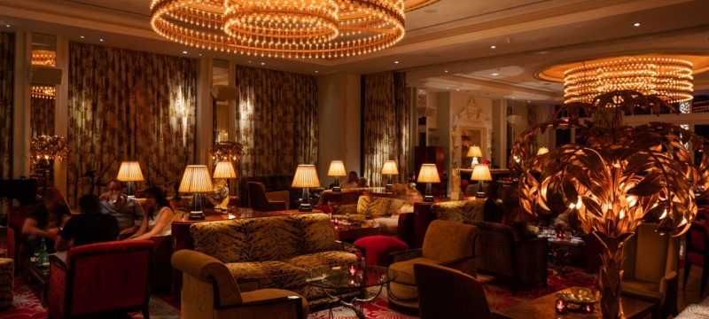Dimly lit lounge area with couches 