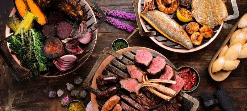aerial view of three dishes at los fuegos