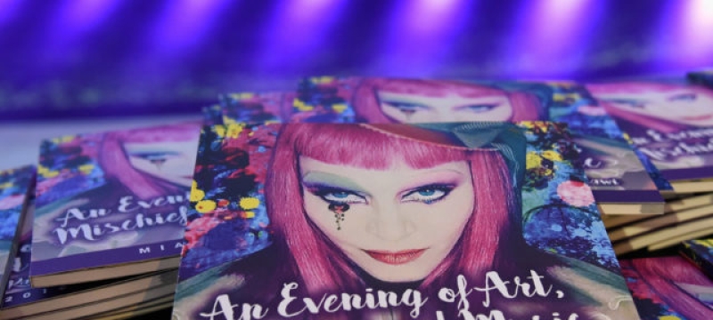 pile of promotional material with Madonna's face on cover 