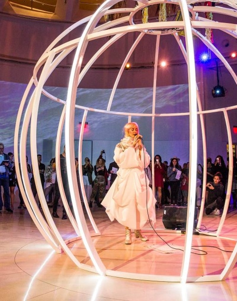 Virgo performs in white sphere 