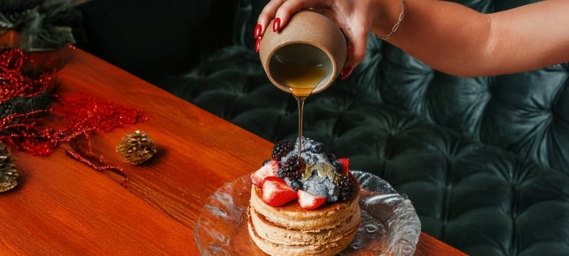 Stack of pancakes and syrup
