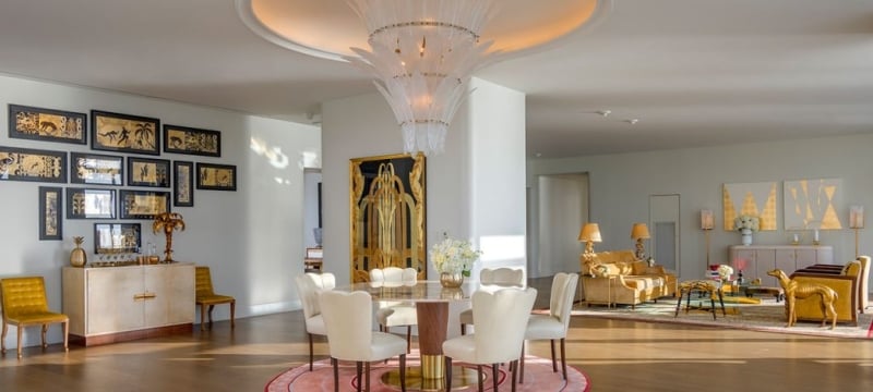 hotel penthouse open space with dining and living areas