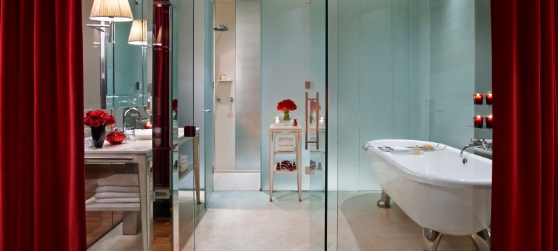 hotel bathroom with large stand alone bathtub